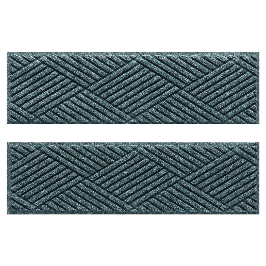 Pair of WaterHog Diamonds fade-resistant stair treads in a light blue/grey crisscrossing linear, bi-level design.