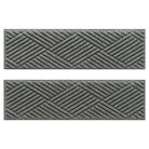 WaterHog indoor/outdoor luxury stair treads in a light grey surface and crisscrossing linear pattern.