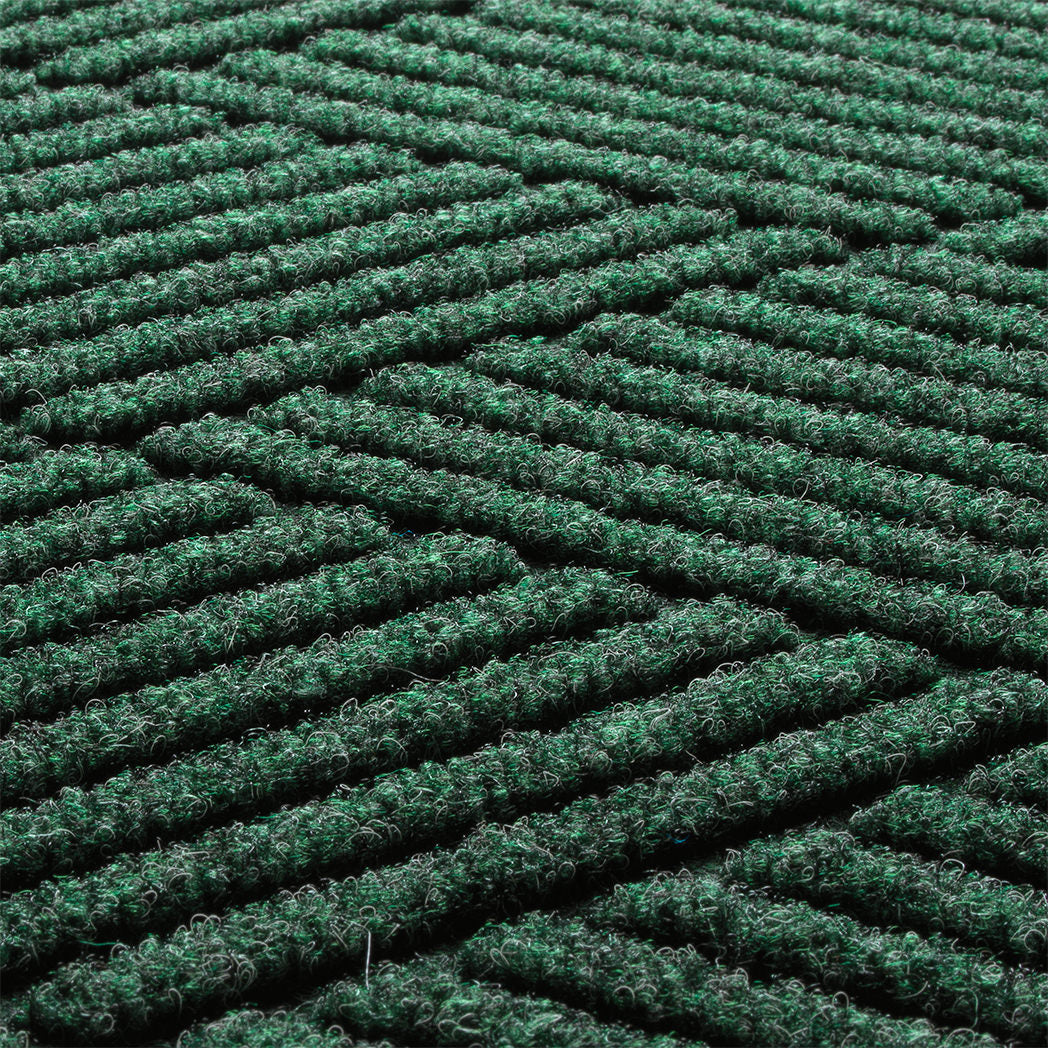 Close-up of the stain-resistant WaterHog surface made of green, white, and grey creating a timeless design.