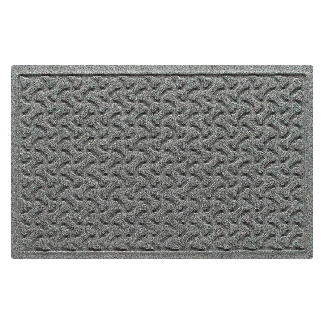 Overhead of a WaterHog medium-sized Dog Bones doormat in a light grey repeating pet bones, bi-level pattern.