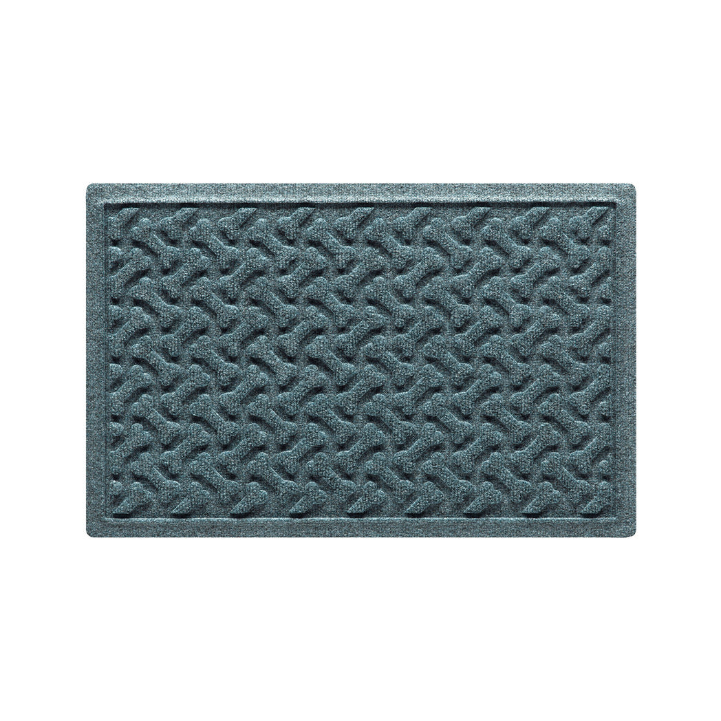 A 18x27 WaterHog Dog Bones bowl mat overhead, in a light blue/grey, fast-drying, bi-level surface.