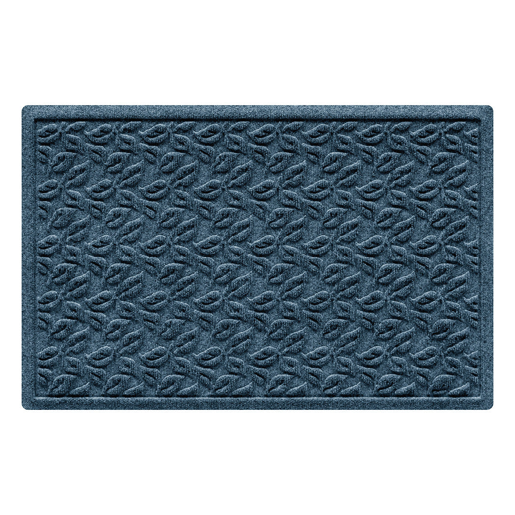 Deep blue 2" x 3" doormat with a repetitive leaf bi-level design