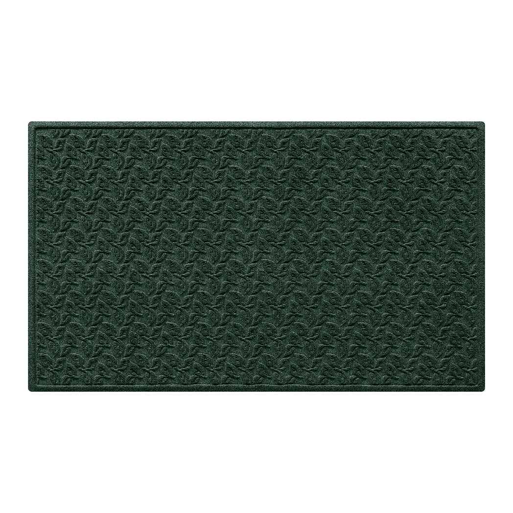 Deep green doormat with a repetitive dogwood leaf pattern from an stain-resistance surface