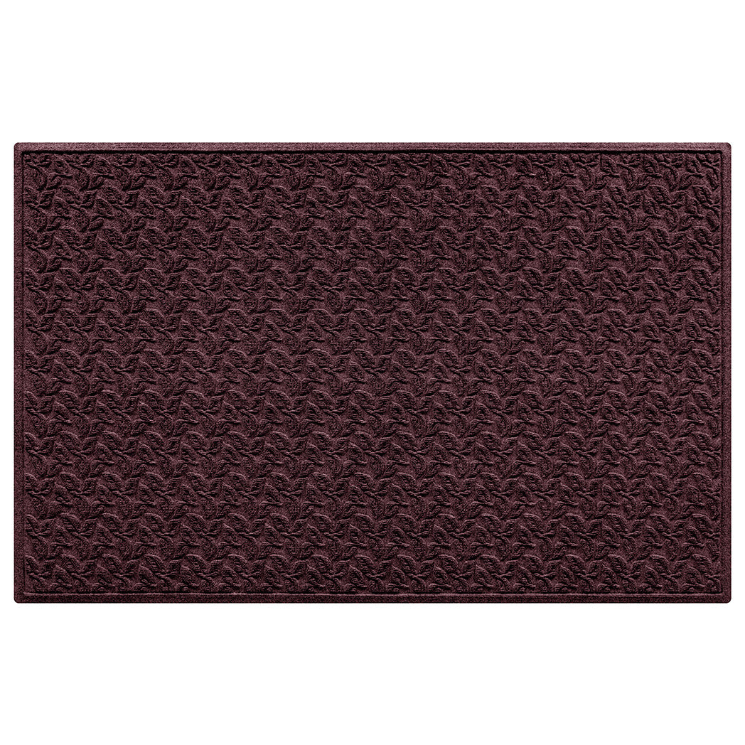 Large wine colored WaterHog doormat with a leafy bi-level pattern for scraping on a white background