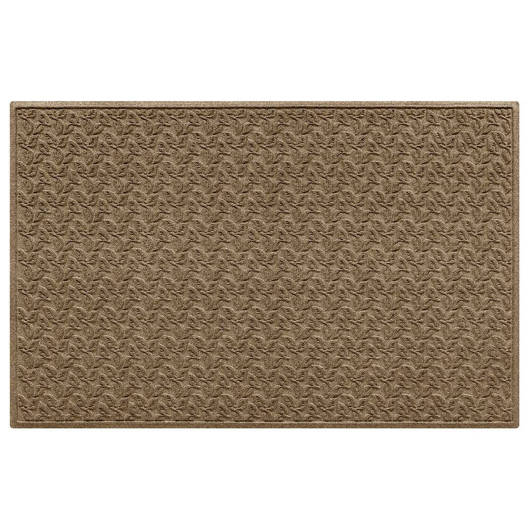 Large WaterHog doormat in camel brown with a leafy bi-level pattern for scraping on a white background