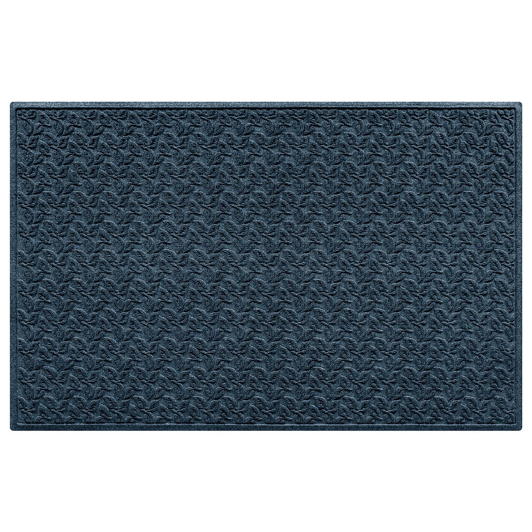 Large navy all-weather doormat with a repetitive leafy pattern with an eco-friendly surface on white background