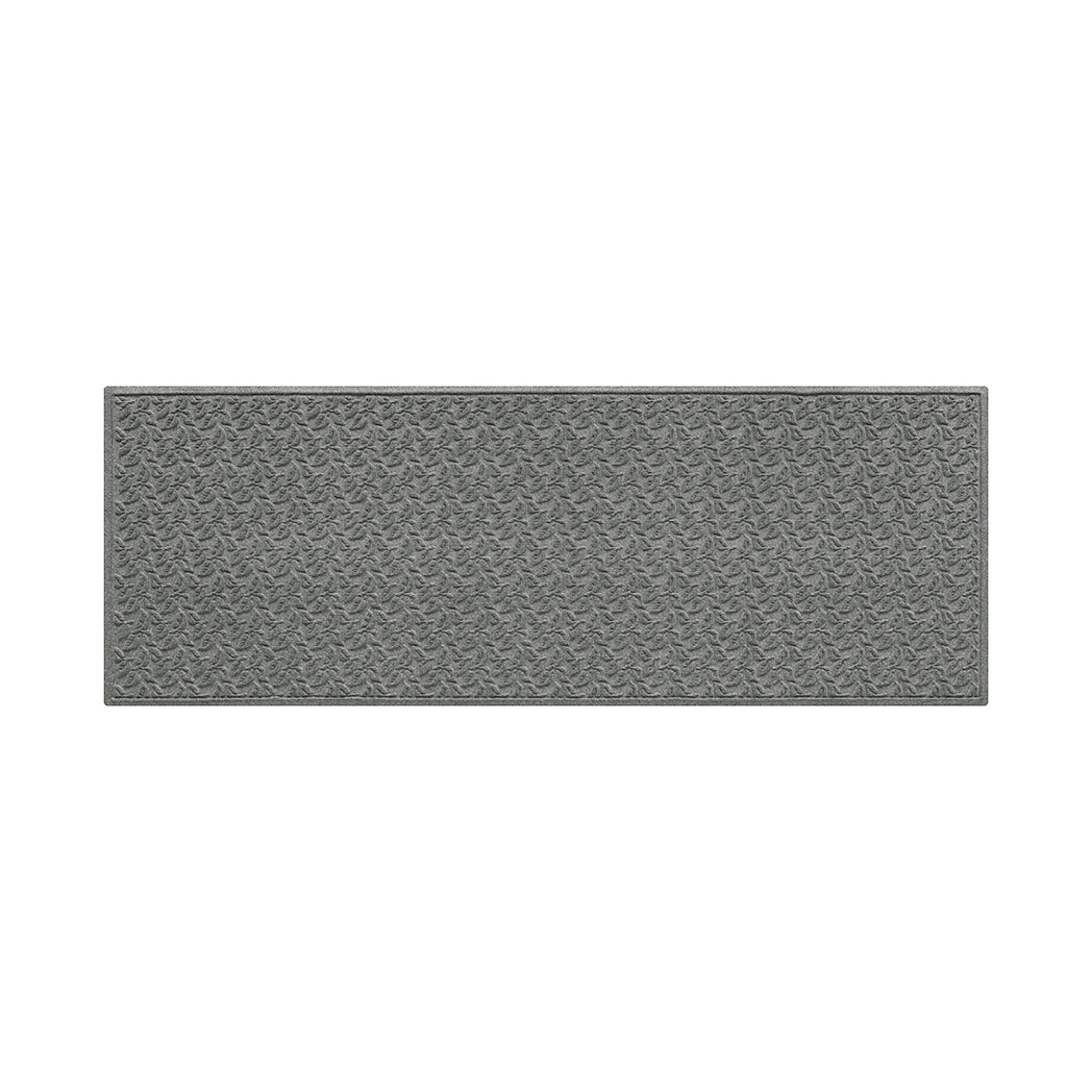 Medium grey all-weather runner doormat with a repetitive dogwood leaf pattern on a white background