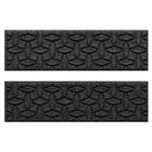 Pair of WaterHog Ellipse modern stair treads with a deep grey interlocking elliptical pattern.