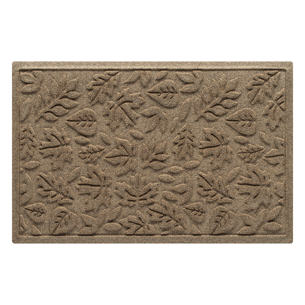 Overhead of a 2x3 Fall Day WaterHog indoor/outdoor doormat in a light tan color and fallen leaves, bi-level design.
