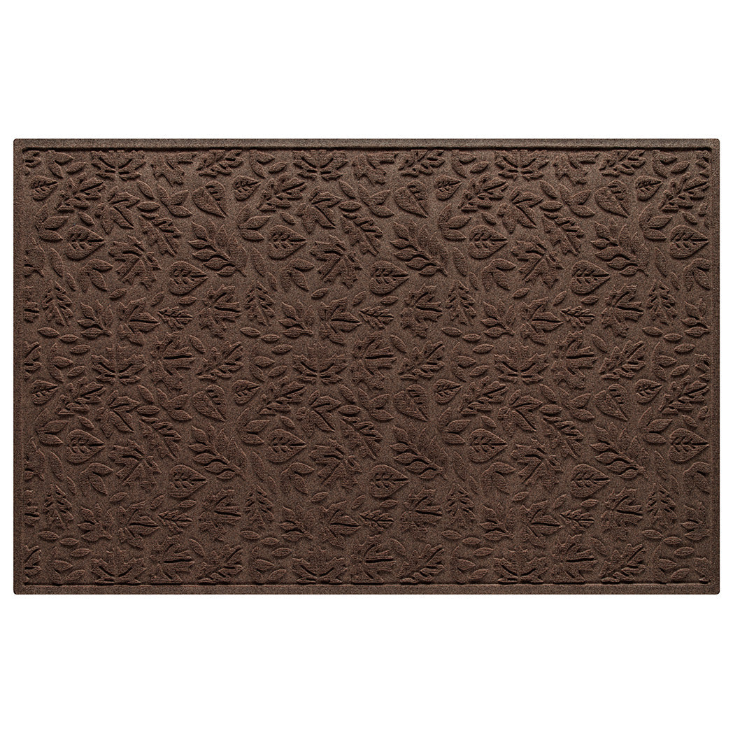 An overhead shot of WaterHog Fall Day 
 extra large outdoor doormat in a dark earthy brown fallen leaves pattern.