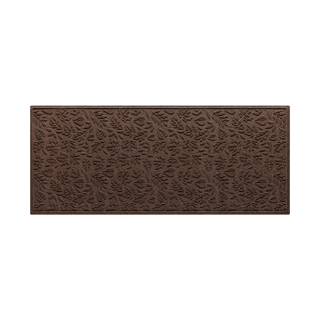 Authentic WaterHog 3x7 all-weather runner in a dark earthy brown fallen leaves design; an American-made mat.