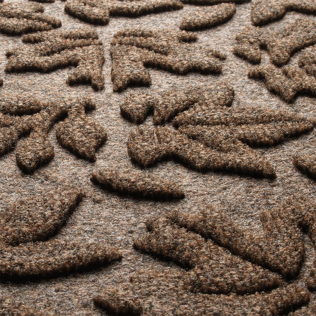 Detail shot of Fall Day's surface made of light and dark brown, white, and black fibers.