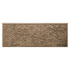 Textured beige doormat with bi-level snowflake pattern on a white background