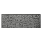 Gray doormat with snowflake pattern on a white background