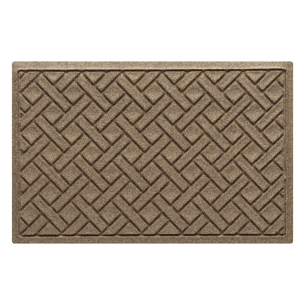 A Lattice WaterHog medium indoor/outdoor doormat in a light tan color and interwoven diagonal lines, bi-level design.