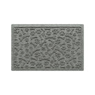 An 18x28 WaterHog Paws & Bones bowl mat overhead, in a light grey surface and durable rubber backing.