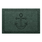 WaterHog Ship's Anchor all-weather doormat in a deep green, featuring a raised anchor design in the center with a decorative rope like border, displayed on a white background.