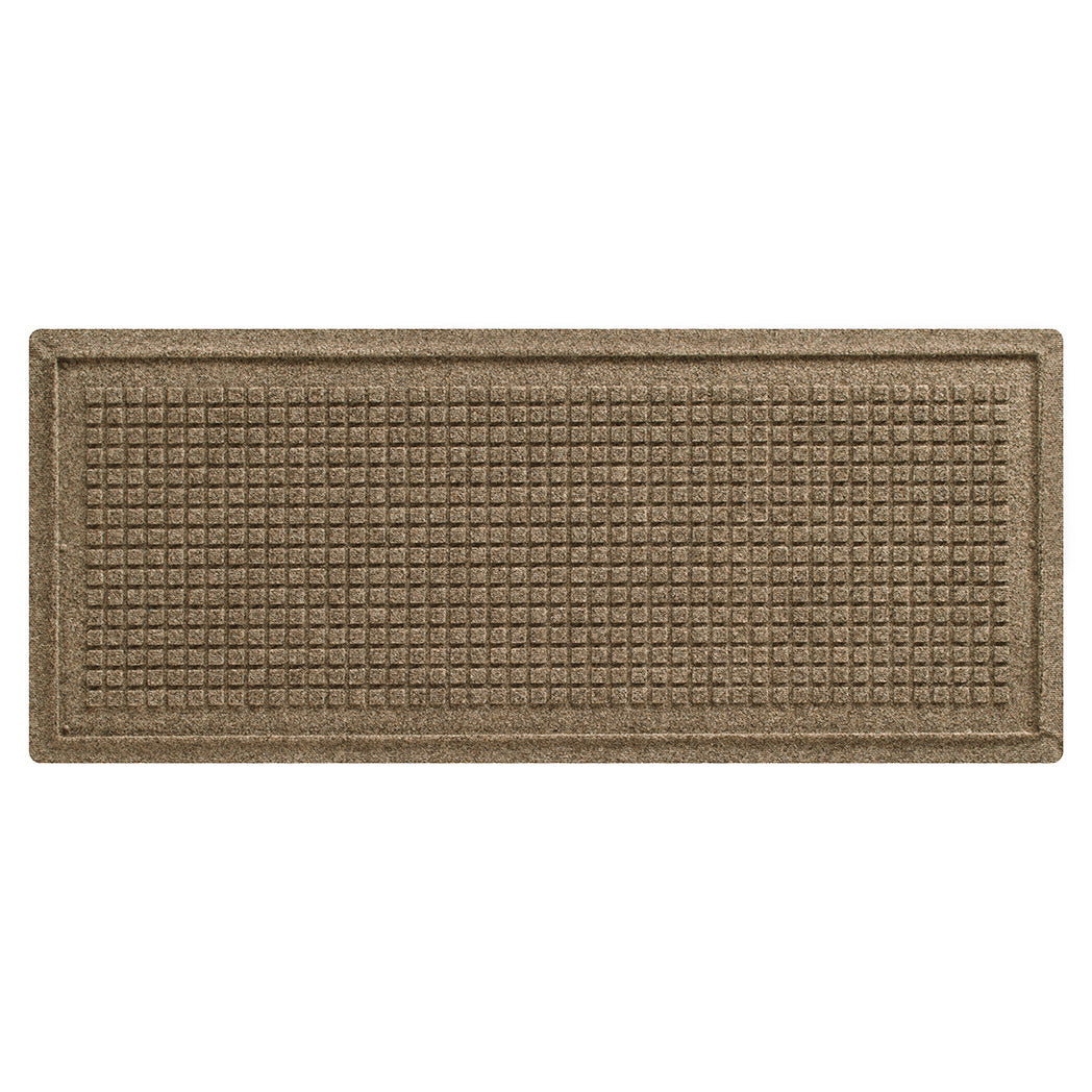An authenitc WaterHog Squares boot tray mat in a light tan bi-level surface with a uniform grid pattern.