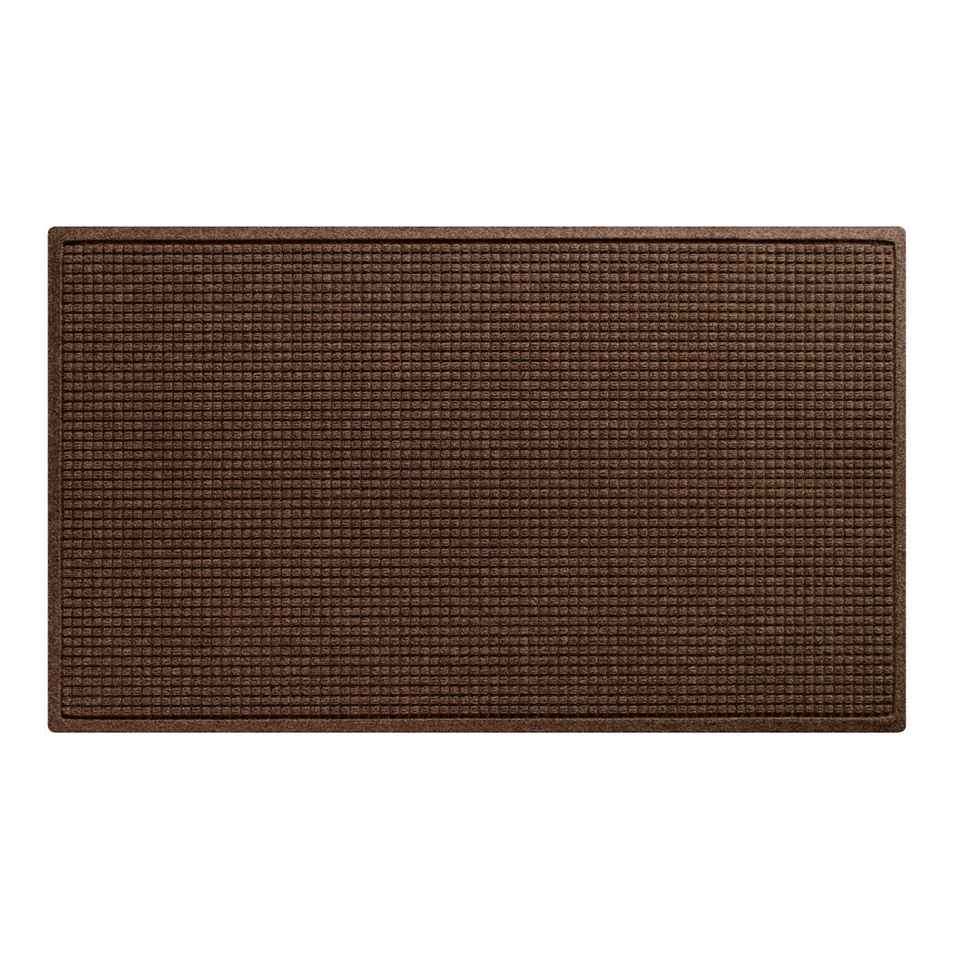 Overhead of a WaterHog large-sized outdoor doormat in a dark earthy brown stain-resistant surface.