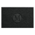 WaterHog Squares modern doormat is monogrammed with the letter M encased in a circle, surrounded by a uniform square grid design, shown in the dark, deep grey.