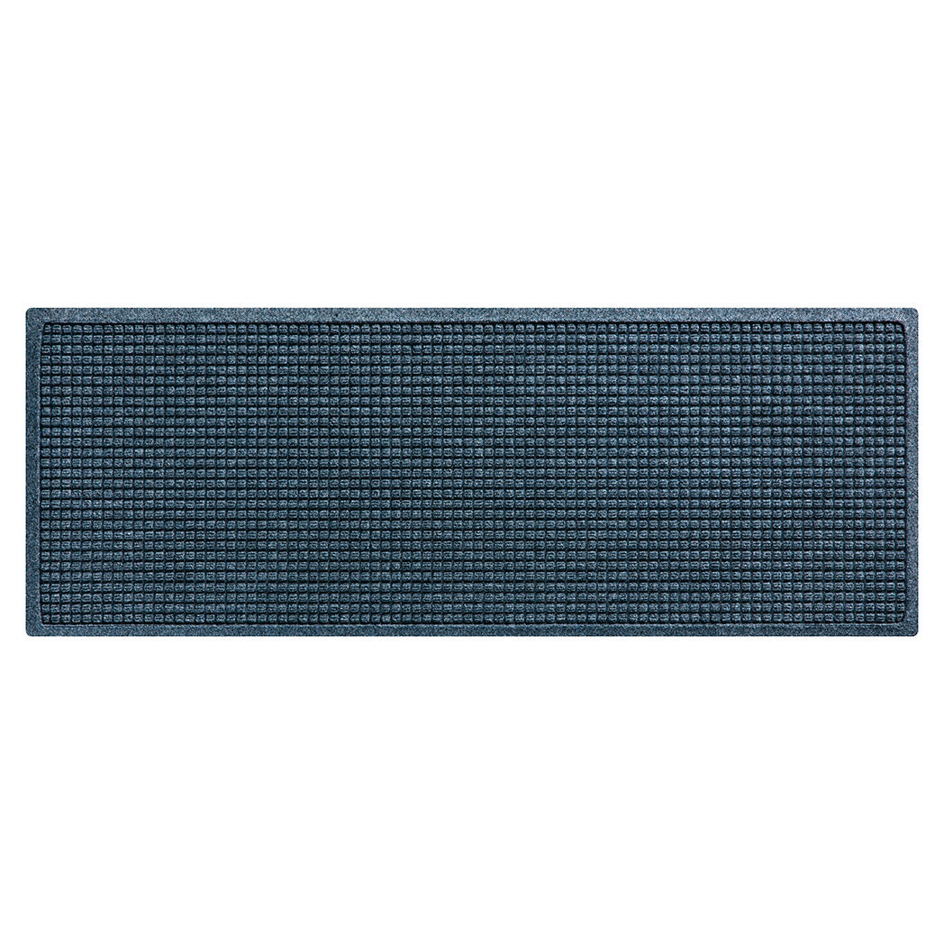 Overhead of a medium Squares WaterHog indoor/outdoor runner bi-level mat with a relaxed navy blue uniform grid design; an American-made mat.
