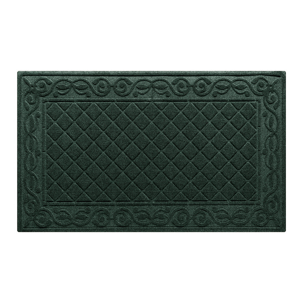 A large WaterHog Tristan doormat in a deep green with a two-part design - an ornate scroll pattern boarding the classic diamonds pattern - all backed by durable rubber that won't crack, crumble, or rot.