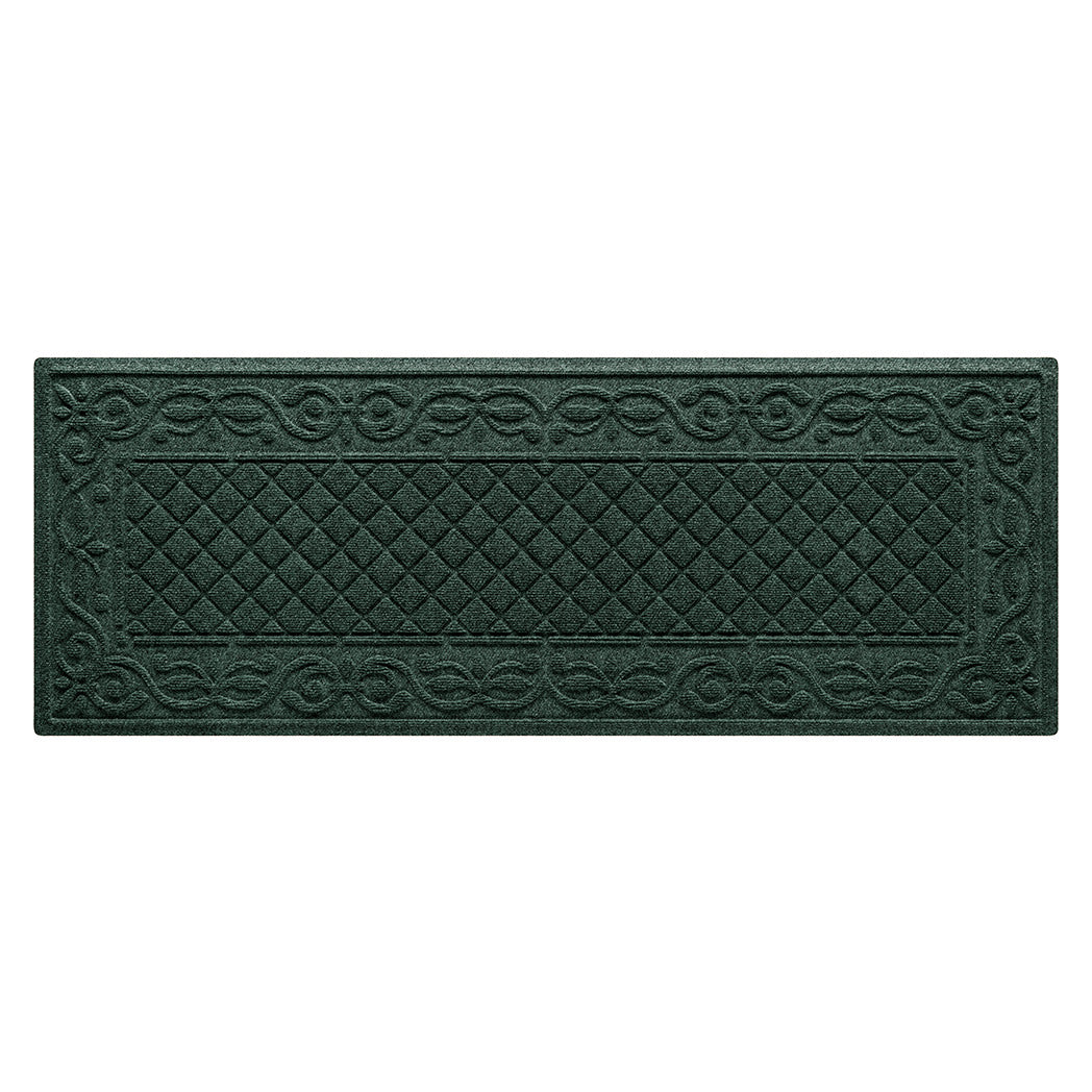 A WaterHog Tristan Runner mat in a deep green color with a two-part design - an ornate scroll pattern boarding the classic diamonds pattern - designed and engineered in the USA.