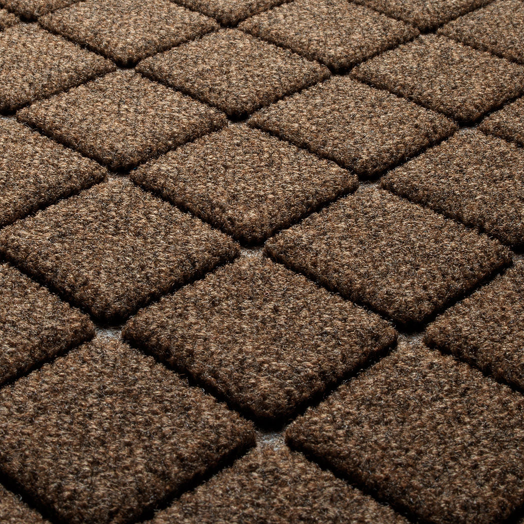 Close-up image of WaterHog argyle bi-level design in medium brown color. 