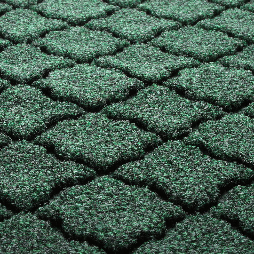 Close-up of the stain-resistant WaterHog surface made of green, white, and grey creating a modern design.