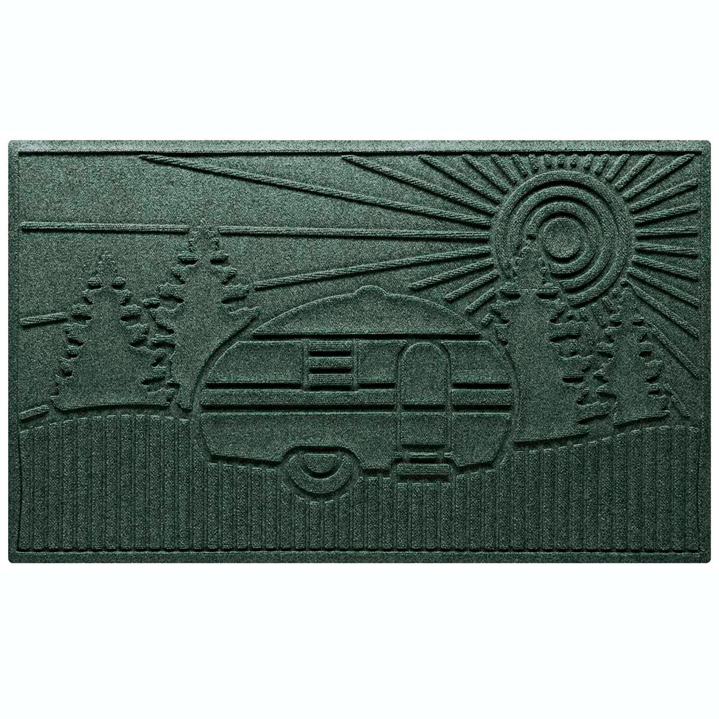 WaterHog RV Large Outdoor Doormat in a deep green color with a design of an RV in the woods with fir trees and a sunset.