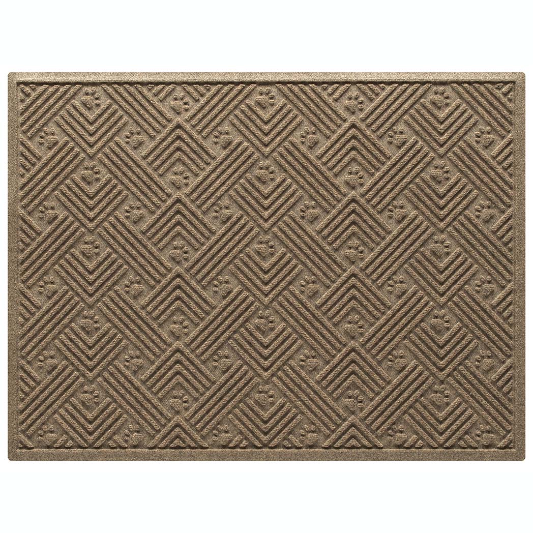 WaterHog Litter Box Mat is a durable litter trapping mat, made in the USA. A double-sized mat, shown in a golden/beige color featuring a bi-level design and durable rubber backing to protect underlying floors. 