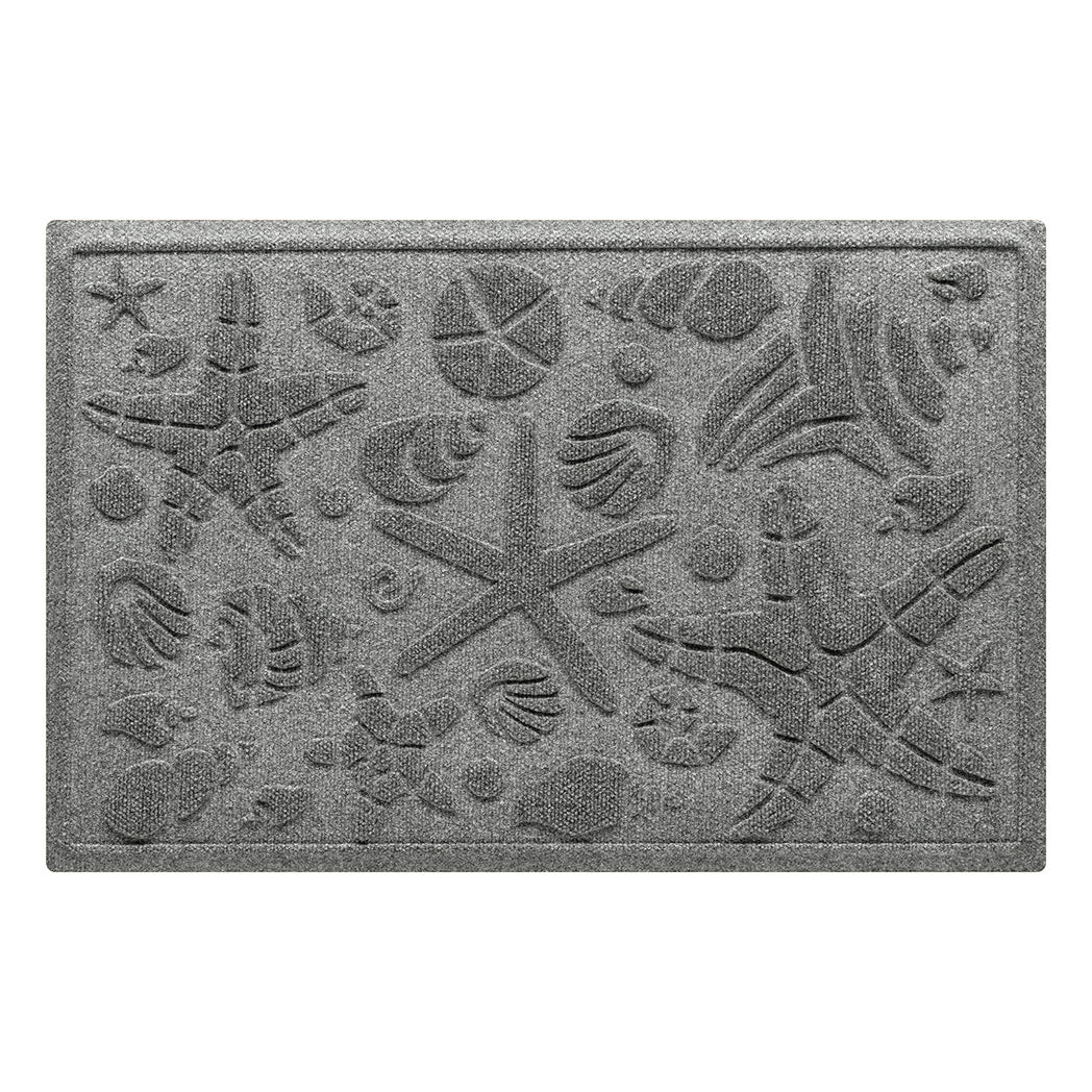 Isolated image of a nautical themed WaterHog Beachcomber medium size all-weather doormat that features a  unique pattern of sea shells and starfish. Shown in medium grey color.