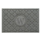 Isolated image of a WaterHog Bombay Monogrammed Outdoor Doormat that features a classic repeating geometric pattern with an encircled letter placed in the center; shown in a medium grey color.