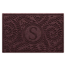 Personalized WaterHog medium Boxwood unique monogram doormat with a deep wine red surface and curling botanical pattern.