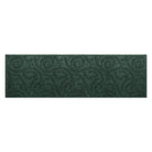 A genuine WaterHog medium-sized runner with a deep green curling botanical design.