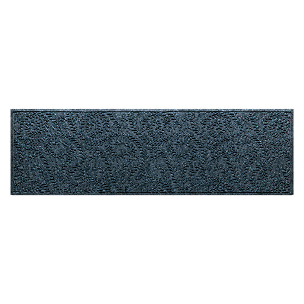 Overhead of a WaterHog modern indoor/outdoor medium runner in a relaxed blue surface and curling botanical pattern.