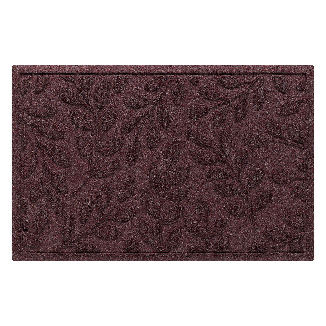 Long-lasting classic WaterHog doormat in leafy deep red design on recycled PET surface. 