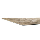 Low-profile designed WaterHog doormat with recycled PET surface and durable rubber backing in a beige/tan color. 