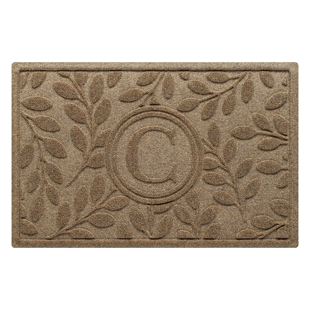 Classic WaterHog indoor/outdoor doormat with a botanical leaf design with a monogrammed letter in the center. Perfect for all weather types and made in the USA. 