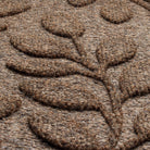 Close-up of recycled PET surface on a WaterHog doormat. Leafy pattern in a bi-level design to help scrape shoes and prevent tracking into your home. 