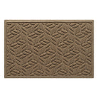 An OG WaterHog medium indoor/outdoor doormat in a light tan leaf petal design, eco-friendly surface, and durable rubber backing.