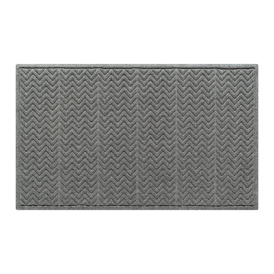 Rectangular medium WaterHog all-weather doormat in a medium grey shade with a bi-level zig-zag pattern designed to effectively scrape dirt and absorb moisture made from eco-friendly materials. 