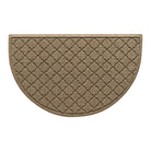 Overhead of a half-round  Cordova indoor/outdoor doormat with a light tan repeating quatrefoil, bi-level design.