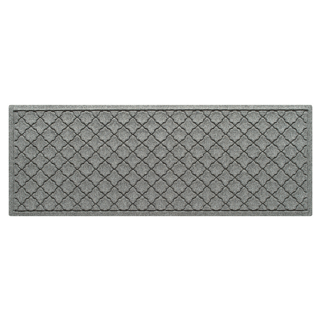 Overhead of a WaterHog 2x5 indoor/outdoor luxury runner in a light grey repeating quatrefoil and eco-friendly, durable surface.