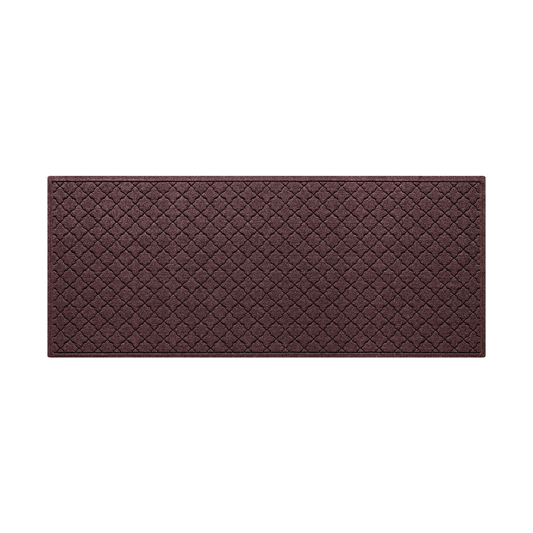 A WaterHog 3x7 outdoor all-weather runner in a deep wine red surface and repeating quatrefoil pattern.