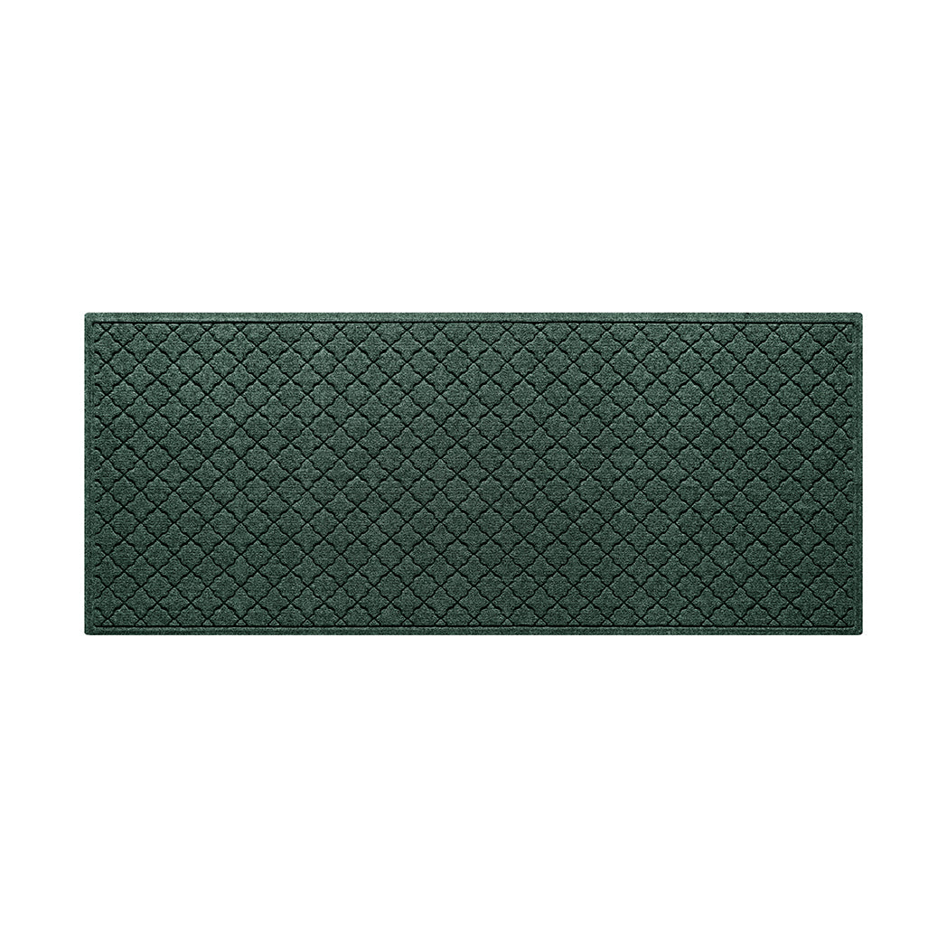 Genuine WaterHog outdoor medium runner with a deep green surface and repeating quatrefoil pattern.