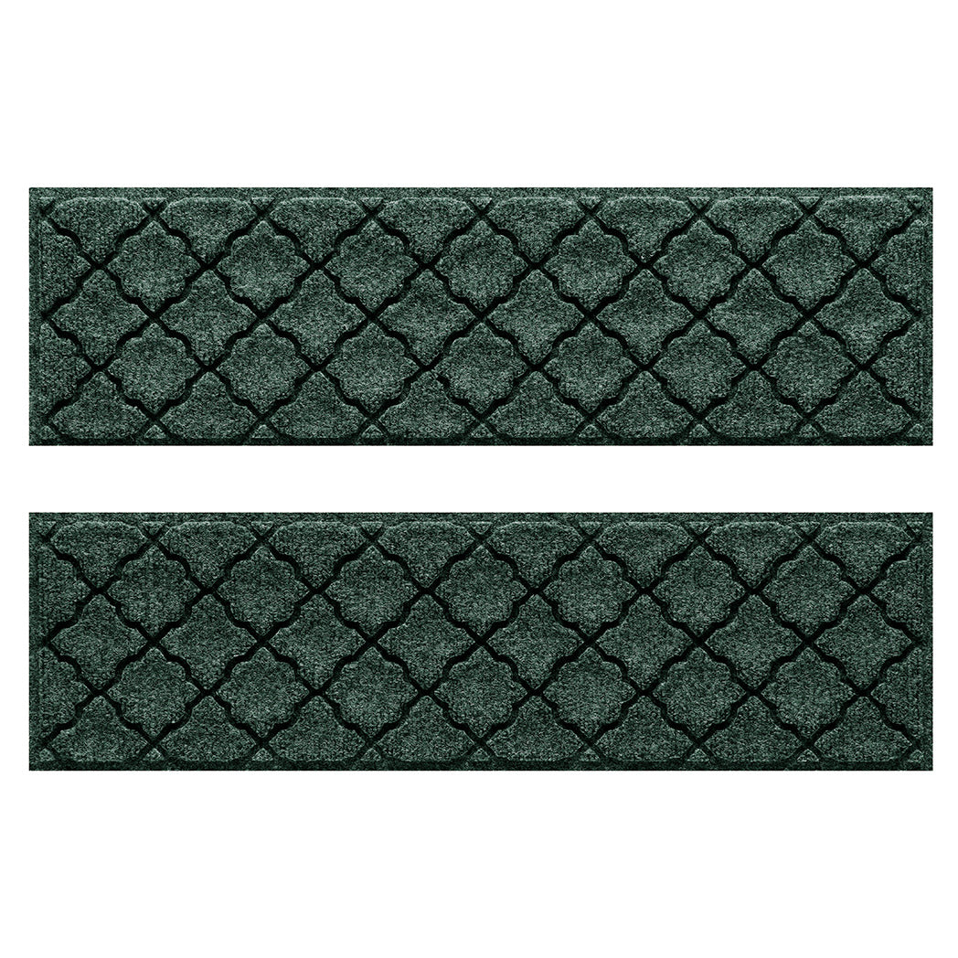 Overhead of a Pair of WaterHog Cordova stair treads with a deep green repeating quatrefoil design.