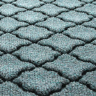 Detail shot of Cordova's eco-friendly surface, made of light blue, grey, and white fibers.