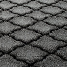 Close-up of WaterHog's the eco-friendly surface fibers made of various shades of grey to black, with hints of white fibers.