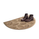 A quality WaterHog luxury half-round-doormat in camel with a pair of clean boots on the mat.